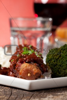 shashlik skewers with broccoli on a white plate 
