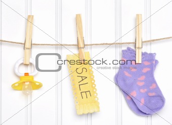 Baby Sale Goods on a Clothesline