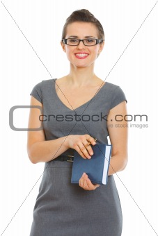 Student woman with notebook and pen