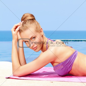 Taking sunbath in bikini