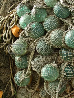 glass float, old fishing nets catch closeup