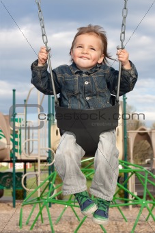 Young Boy Swinging