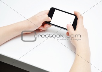 Hands with touchscreen smartphone