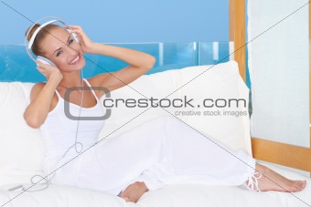 Sensual woman listening to music