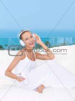 Vivacious woman listening to music