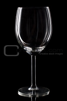 Wine glass over black background. Studio shot.