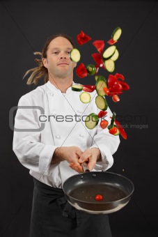 Tossing vegetables while cooking