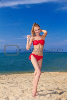 Beautiful female posing in red bikini