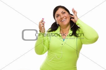 Attractive Middle Aged Hispanic Woman In Workout Clothes with Music Player and Headphones Against a White Background.