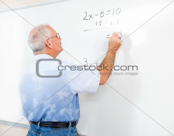 Stock Photo of Teacher or Adult Student at Blackboard