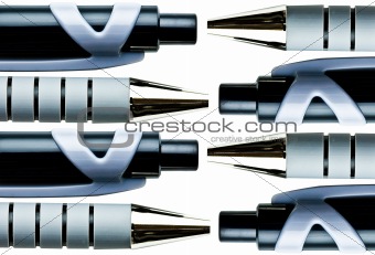 macro close up of  ball point pens isolated over white