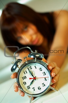 brunette with clock