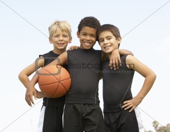 Young Boy Playing Basketball