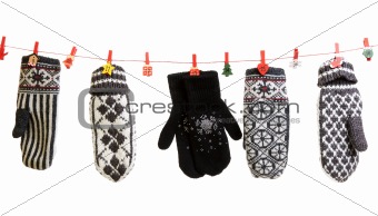 Winter knitted gloves hang