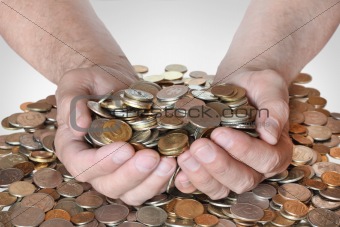 a lot of coins in the hands of men