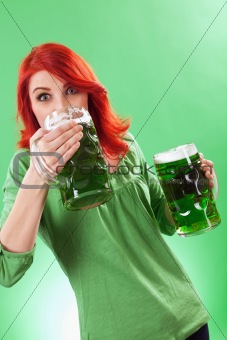 Redhead enjoying green beer