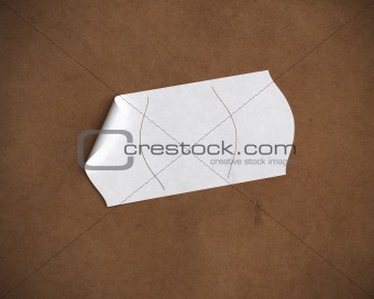blank price tag over recycled paper