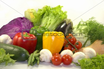 Bright vegetables on white background