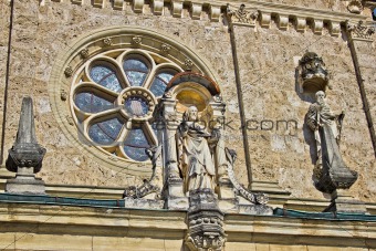 Church architectural detail - window and saint statue