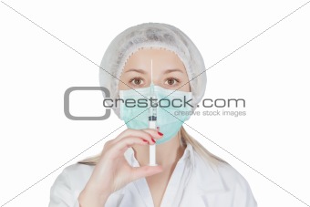 Pretty nurse with an injection and uniform. Isolated.