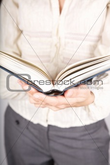 book and businesswoman