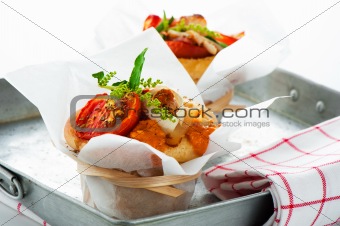 Fresh pizza muffin as a snack on white background as a studio sh