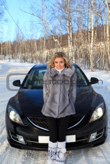 Young woman near the car