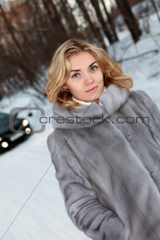 Young woman near the car