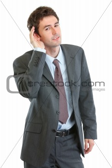 Businessman trying to hear valuable information