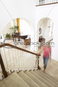 House Interior Showing Staircase And Abstract Female Figure