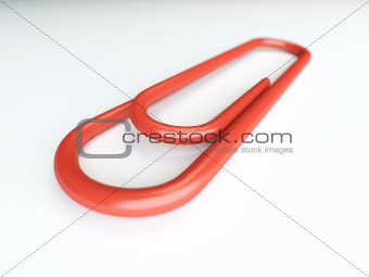 red paper clip close up with depth of field