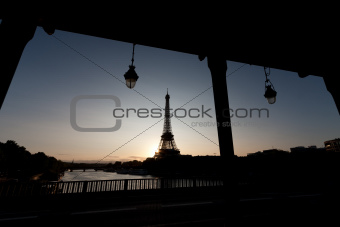 Silhouette of Eiffel tower and a bridge