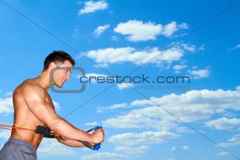 Exercising over sky background