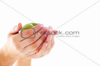 Female hands with nice manicure and apple