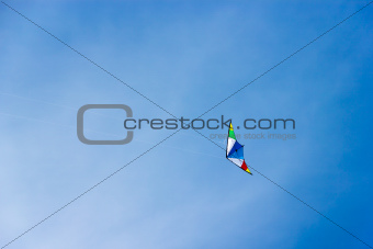 colorful kite soaring in a nice blue sky