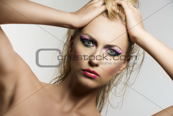 blonde girl's beauty portrait she looks in to the lens