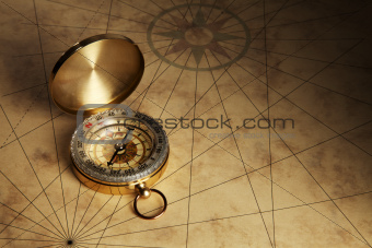 Compass on the old paper background 