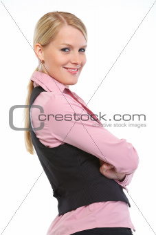 Portrait of smiling woman with crossed arms