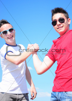 Teenager shaking hands