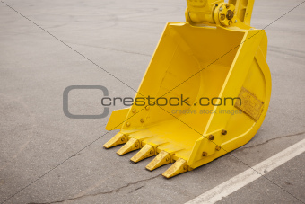 yellow clear excavator bucket 