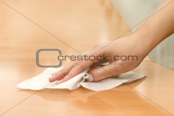 hand with wet wipe