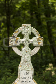 In loving memory with cross in Graveyard
