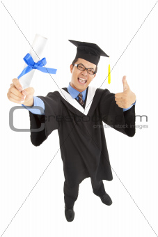happy graduating student holding diploma  with thumbs up