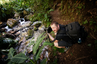 Photographer at a Stream