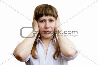 young girl covers his ears with his hands