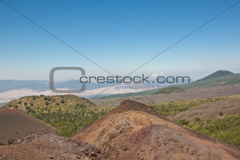The volcano Etna landscape in a blue sky 