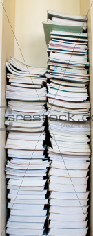 High stack of used books