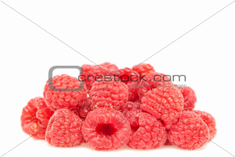 Fresh Raspberries Closeup on a white background.