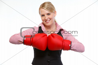 Smiling woman employee in boxing gloves