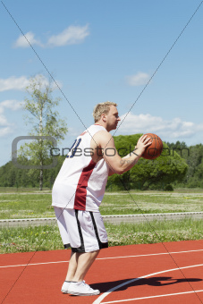 Basketball player with the ball